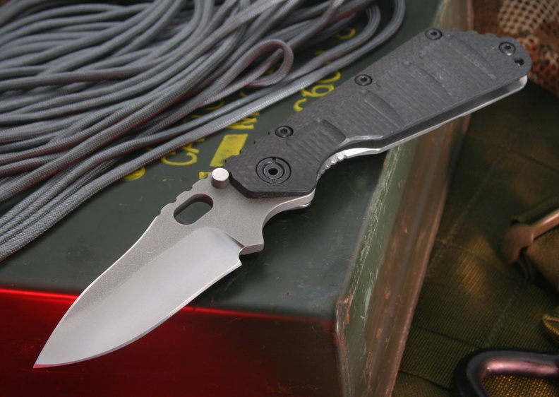 Duane_Dwyer_SMF_Carved_CF_Custom_Tactical_Folding_Knife.jpg