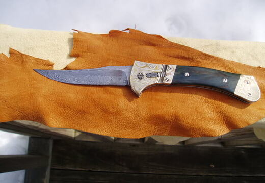 JD Smith MS damascus auto with mammoth mokume and filework