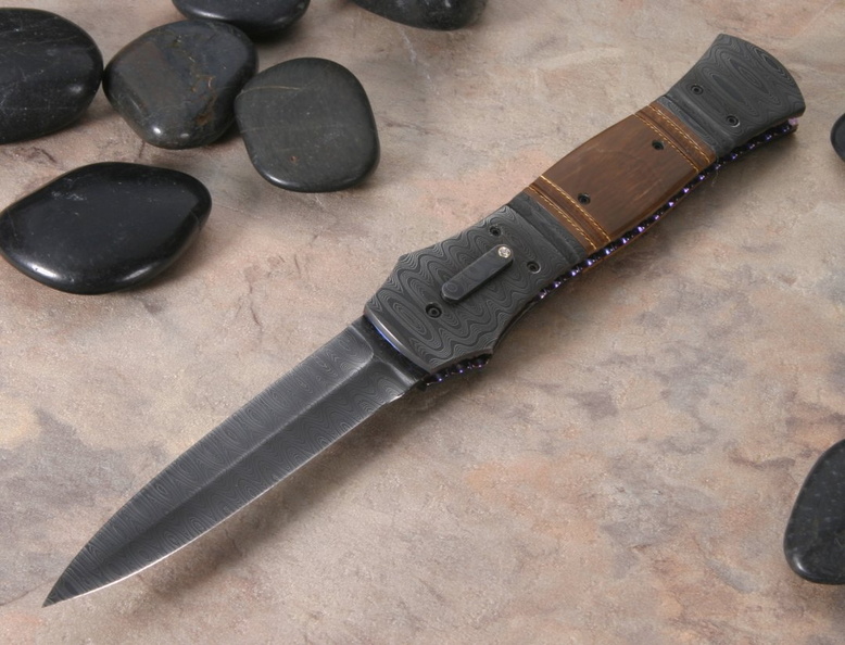Jim_Minnick_Phantom_Mammoth_and_Damascus_Folding_Knife.jpg