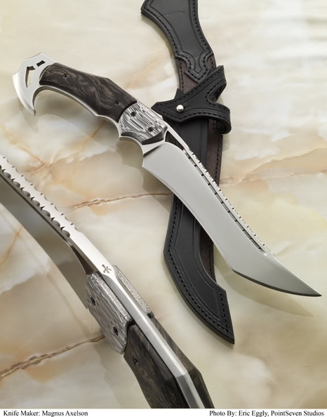 Magnus_Axelson_D2_steel_with_Damasteel_bolster_and_Silvervine_scales.jpg