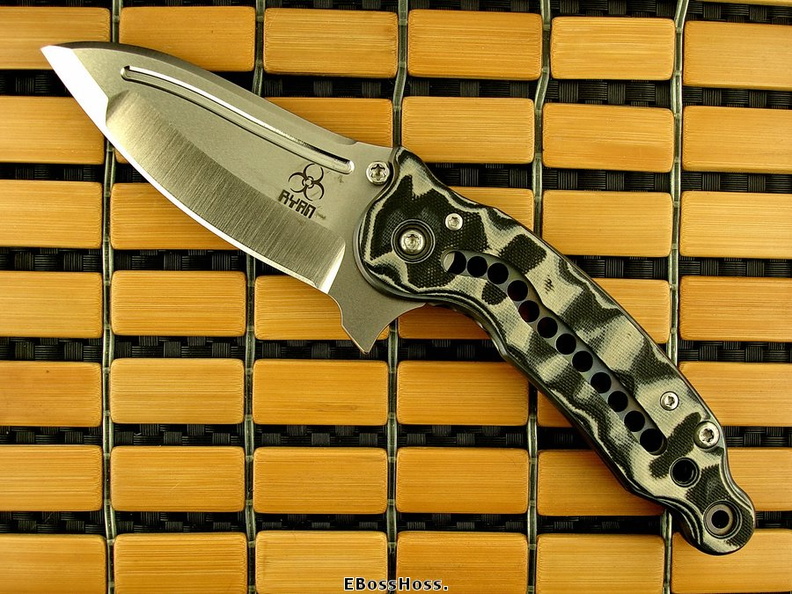 Steve_Ryan_Spinosaurus_Framelock_Flipper.jpg