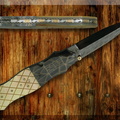 Jerry Corbit Model 11 Dagger gold lip checkered