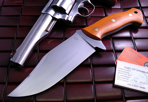Tom Krein This is the Beast in amber canvas micarta with black liners